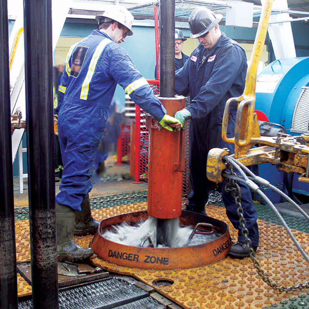 Katch Kan rig safety system in use on a rig floor